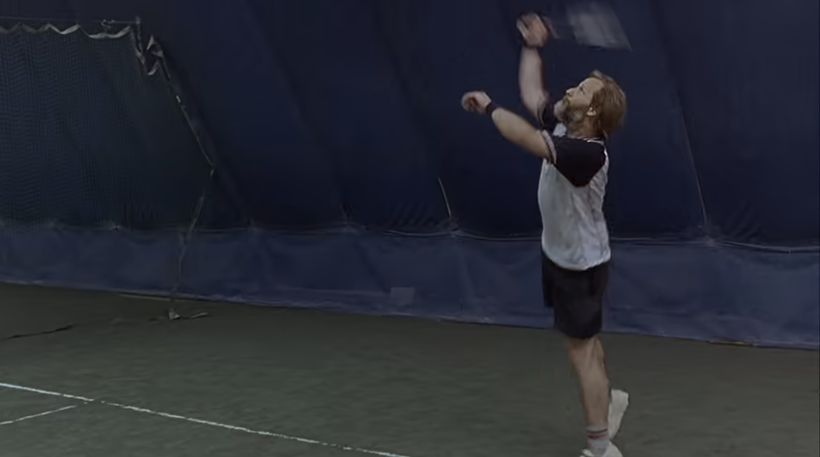 Jeff Daniels serving in tennis in Squid and the Whale